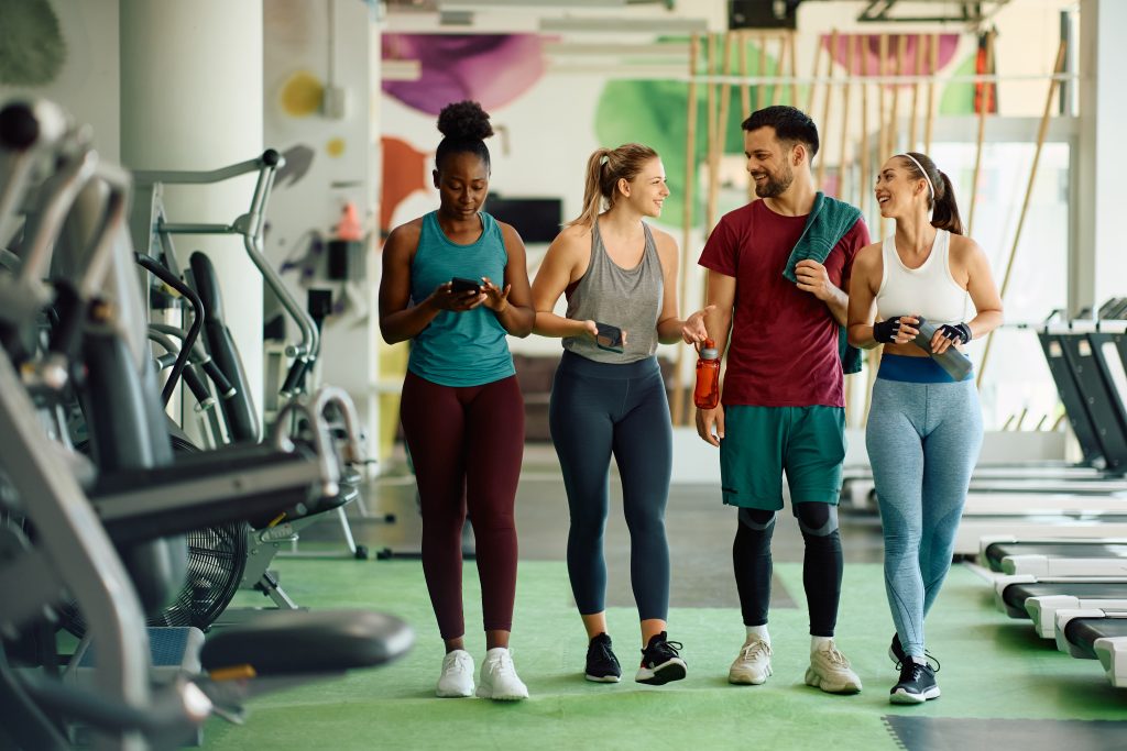 Members walking through a gym
