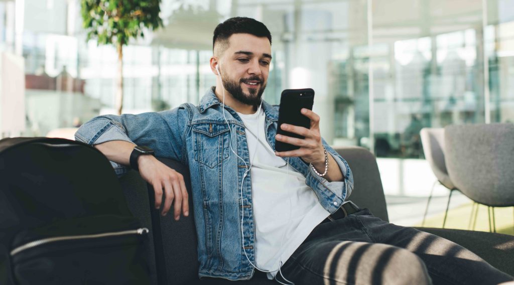 An attendee back at home reading a post-event WhatsApp follow-up