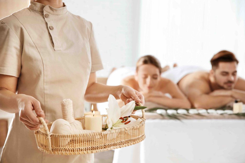 Therapist preparing a spa treatment