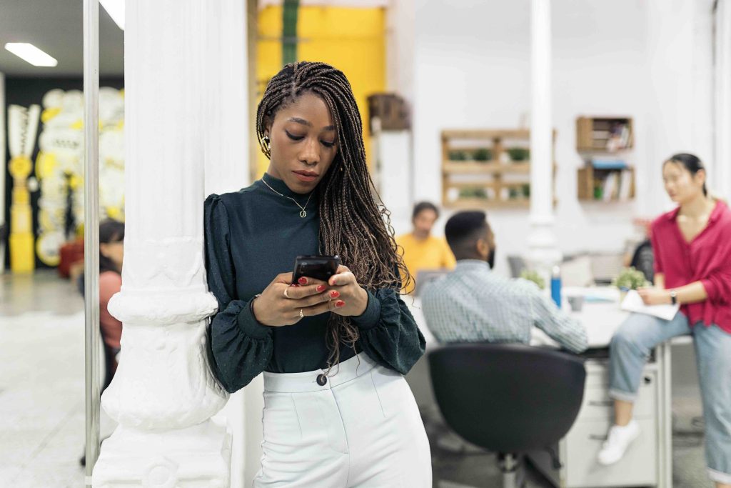 A customer asking a question on her phone
