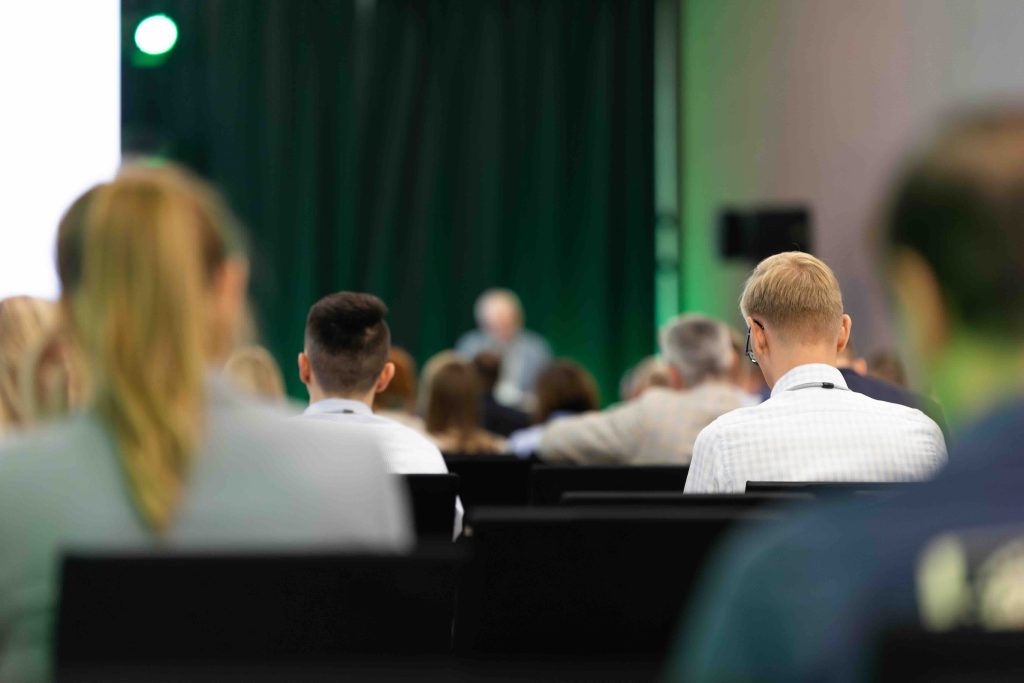 An audience at a business event